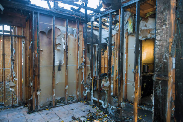 Professional Fire Damage Restoration technician working in Newport, KY
